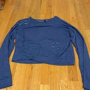 Women’s small long sleeve shirt with rips